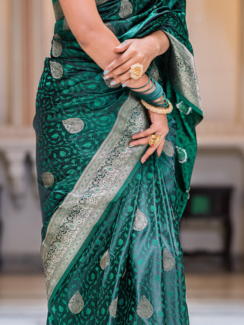 Teal green self woven gajji silk saree