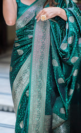 Teal green self woven gajji silk saree
