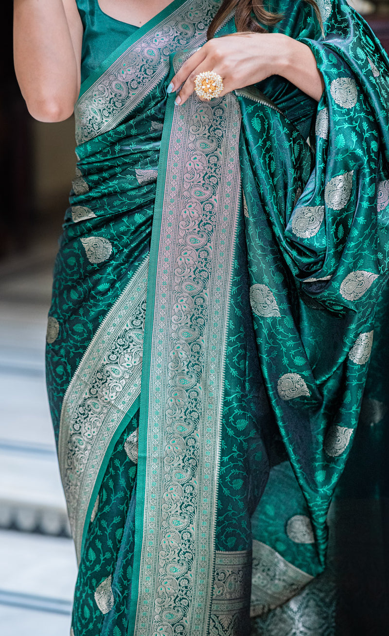 Teal green self woven gajji silk saree