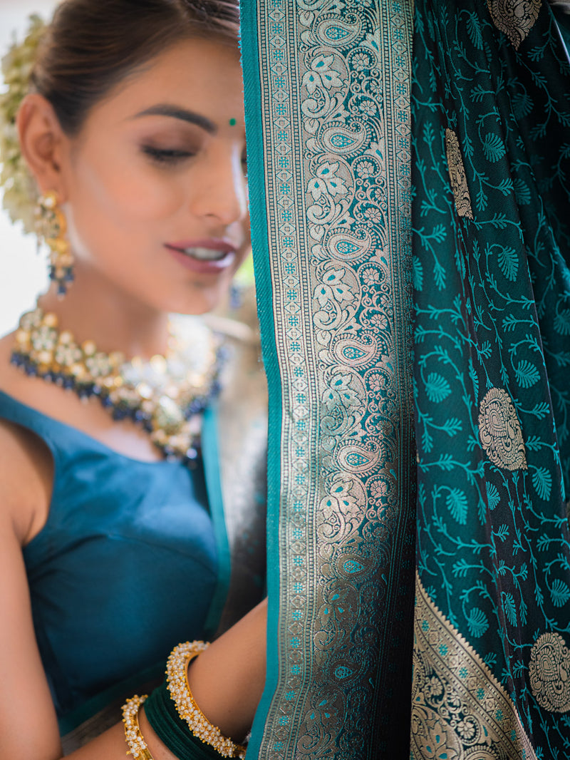 Teal blue self woven gajji silk saree