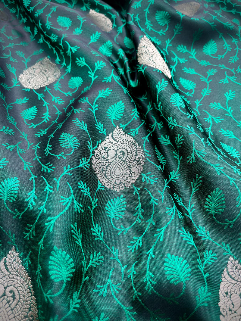 Teal green self woven gajji silk saree