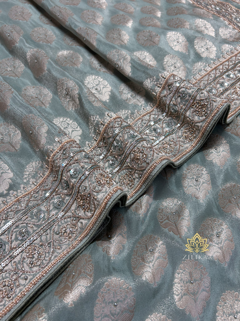 Ocean Green Zari Tissue Silk Saree with Beautiful Hand Embroidery