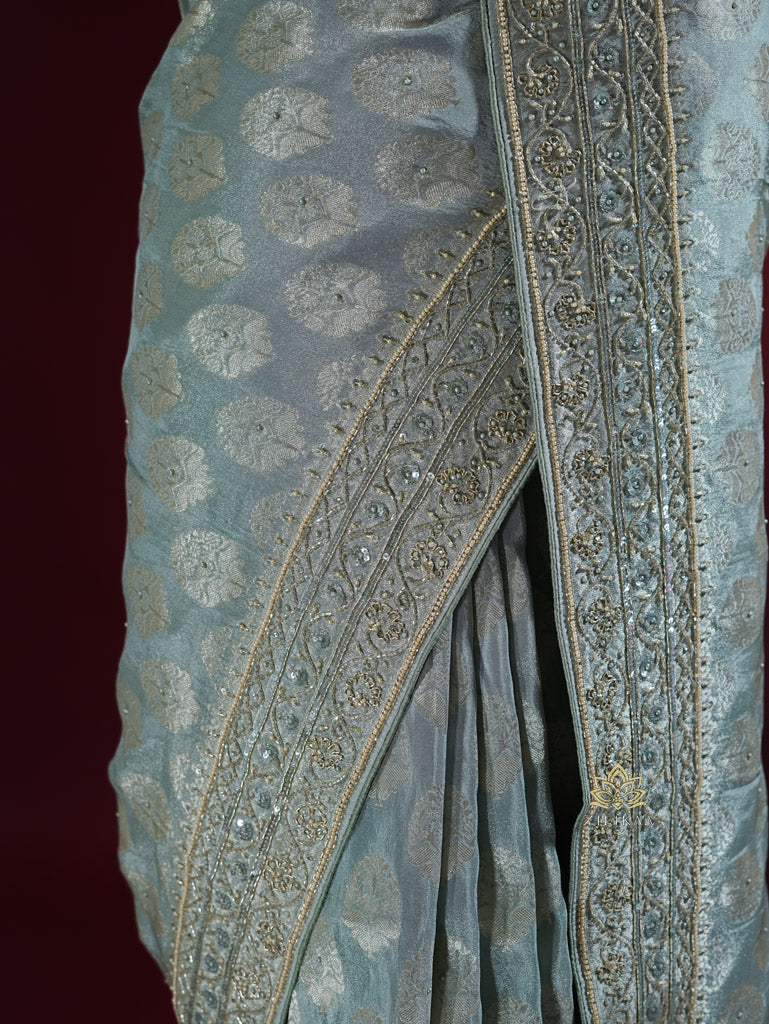 Ocean Green Zari Tissue Silk Saree with Beautiful Hand Embroidery