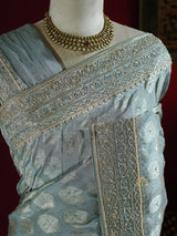Ocean Green Zari Tissue Silk Saree with Beautiful Hand Embroidery