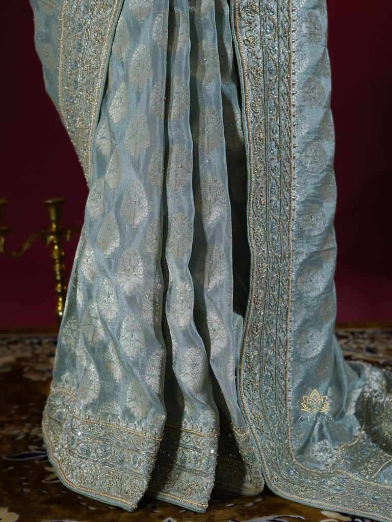 Ocean Green Zari Tissue Silk Saree with Beautiful Hand Embroidery