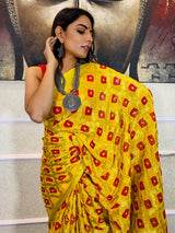 Sacred Yellow Red Georgette Bandhej Saree