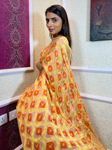 Pastel Orange Georgette Bandhej Saree